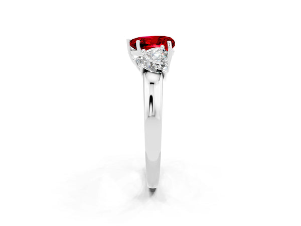 Platinum Heart Cut Ruby Three-Stone Ring with Four-Prong Setting and Classic Band