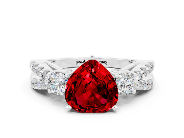 Platinum Heart Cut Ruby Three-Stone Ring with Pavé Split Shank and Four-Prong Setting