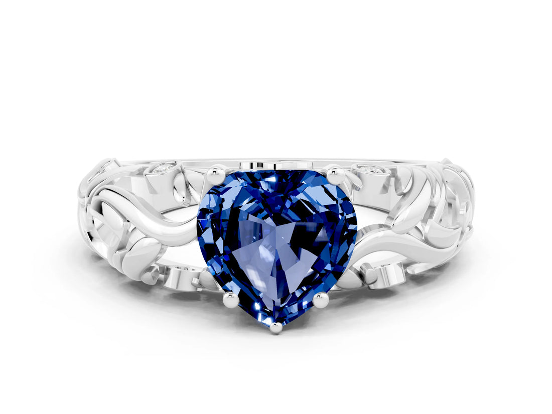 White gold Heart Cut Solitaire Blue Sapphire Leaf-Inspired Vine Band Ring with Prong Setting