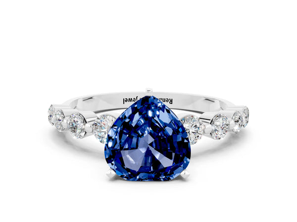 Platinum Heart Cut Solitaire Blue Sapphire Ring with Pave Band and Four-Prong Setting