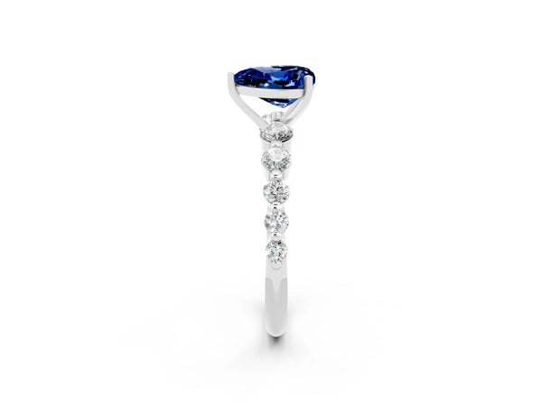Silver Heart Cut Solitaire Blue Sapphire Ring with Pave Band and Four-Prong Setting
