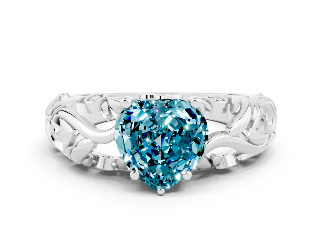 White gold Heart Cut Solitaire Blue Topaz Leaf-Inspired Vine Band Ring with Prong Setting