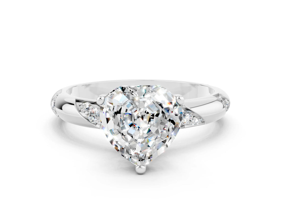White gold Heart Cut Solitaire Diamond Engagement Ring with Twisted Pave Band and Four-Prong Setting