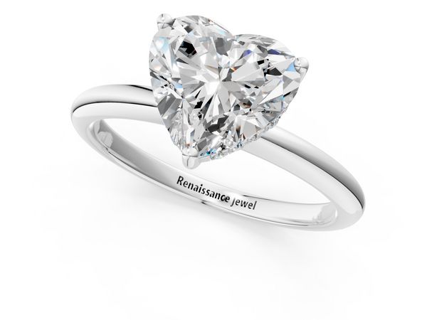 White gold Heart Cut Solitaire Engagement Ring with Four-Prong Setting and Classic Band
