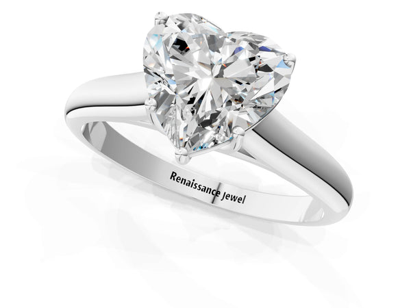 White gold Heart Cut Solitaire Engagement Ring with Tapered Band and Four-Prong Setting