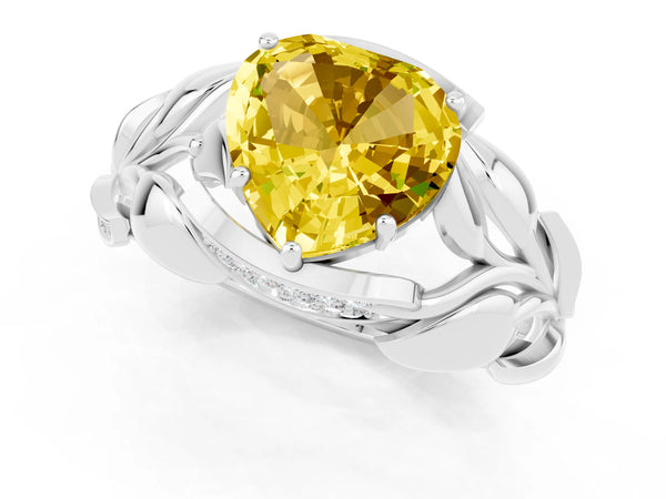 Platinum Heart Cut Yellow Sapphire Leaf-Inspired Engagement Ring with Round Accents and Prong Setting