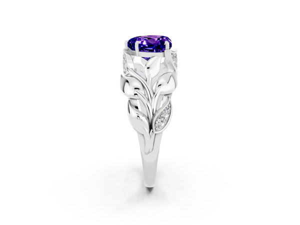 White gold Heart Cut Tanzanite Leaf-Inspired Engagement Ring with Round Accents and Prong Setting
