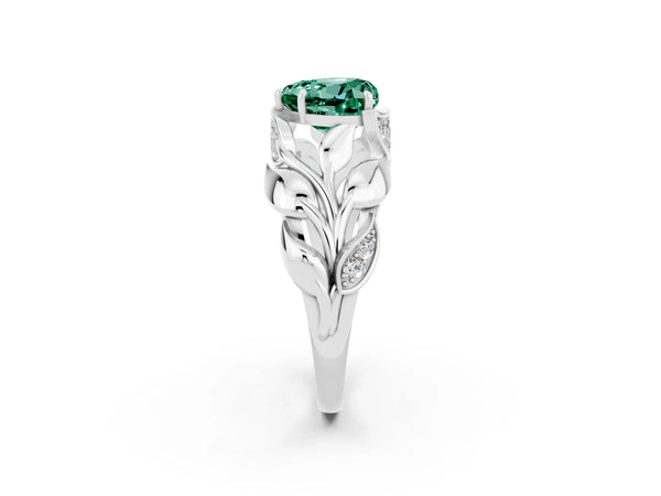 Silver Heart Cut Green Sapphire Leaf-Inspired Engagement Ring with Round Accents and Prong Setting