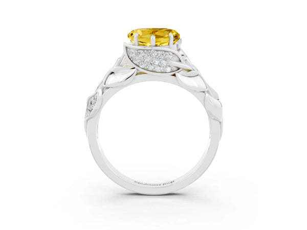 Platinum Heart Cut Yellow Sapphire Leaf-Inspired Engagement Ring with Round Accents and Prong Setting