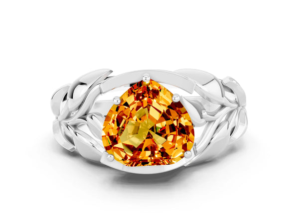 Platinum Heart Cut Citrine Leaf-Inspired Engagement Ring with Round Accents and Prong Setting