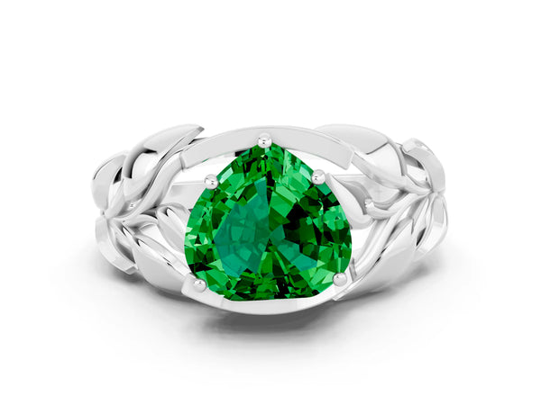 Silver Heart Cut Emerald Leaf-Inspired Engagement Ring with Round Accents and Prong Setting