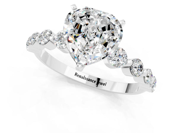 Platinum Heart Cut Solitaire Moissanite Ring with Pave Band and Four-Prong Setting