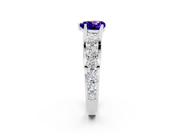 Platinum Heart Cut Tanzanite Engagement Ring with Pavé Band and Four-Prong Setting