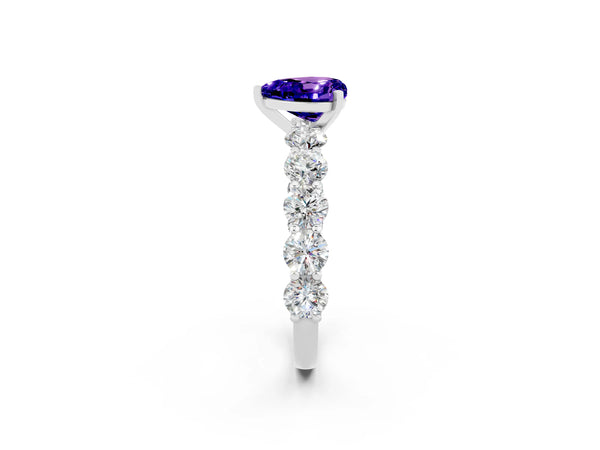 Platinum Heart Cut Tanzanite Prong Setting with Side Stones on a Pave Band