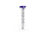 White gold Heart Cut Tanzanite Prong Setting with Side Stones on a Pave Band_2