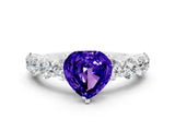 White gold Heart Cut Tanzanite Prong Setting with Side Stones on a Pave Band