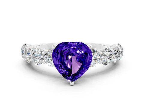 White gold Heart Cut Tanzanite Prong Setting with Side Stones on a Pave Band