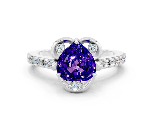 Silver Heart Cut Tanzanite Ring with Pavé Band and Floral Prong Setting