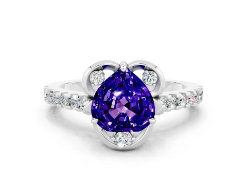 White gold Heart Cut Tanzanite Ring with Pavé Band and Floral Prong Setting