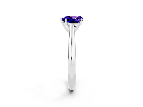 White gold Heart Cut Tanzanite Solitaire Engagement Ring with Cathedral Setting and Four-Prong Mount