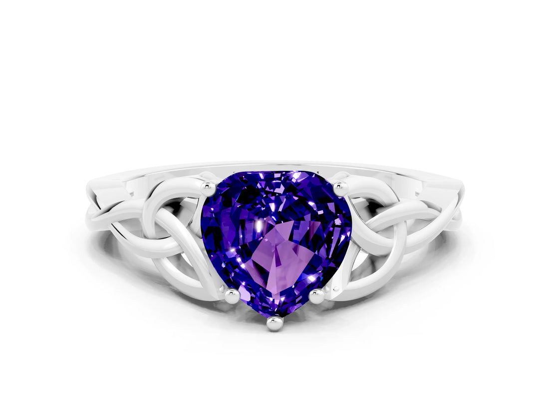 White gold Heart Cut Tanzanite Solitaire Engagement Ring with Celtic Knot Band and Four-Prong Setting