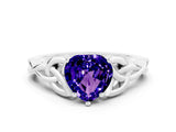 White gold Heart Cut Tanzanite Solitaire Engagement Ring with Celtic Knot Band and Four-Prong Setting