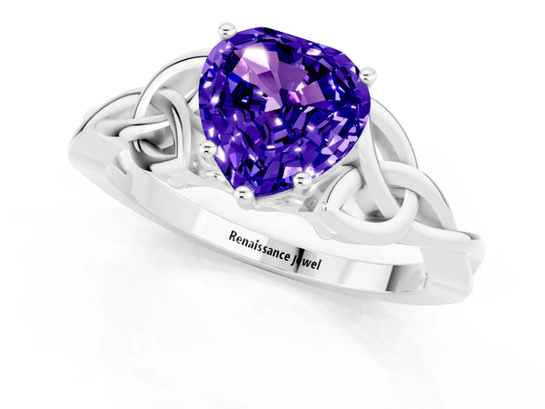 Silver Heart Cut Tanzanite Solitaire Engagement Ring with Celtic Knot Band and Four-Prong Setting
