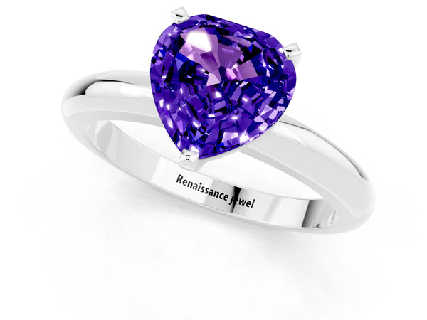 Platinum Heart Cut Tanzanite Solitaire Engagement Ring with Round Band and Four-Prong Setting