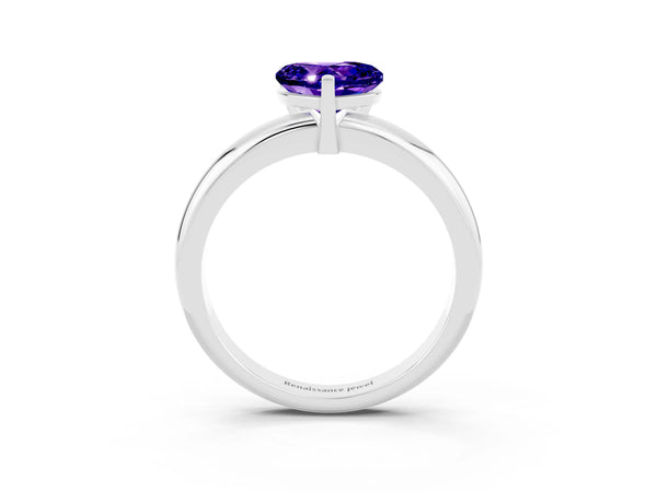Platinum Heart Cut Tanzanite Solitaire Engagement Ring with Round Band and Four-Prong Setting