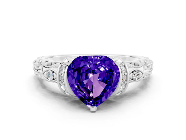 Platinum Heart Cut Tanzanite Solitaire Ring with Filigree Band and Four-Prong Setting