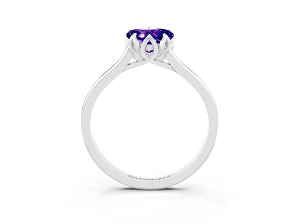 Platinum Heart Cut Tanzanite Solitaire Ring with Flower Prong Setting and Classic Band