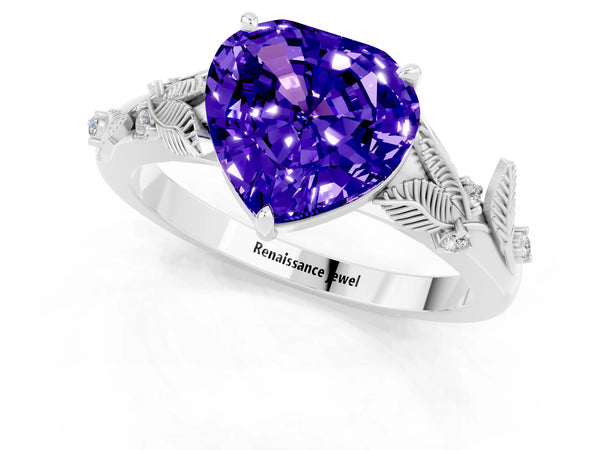 Silver Heart Cut Tanzanite Solitaire Ring with Leaf Motif Band and Four-Prong Setting