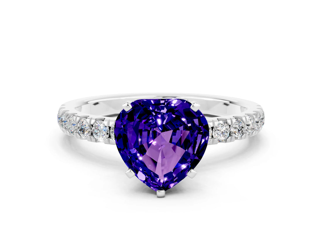 White gold Heart Cut Tanzanite Solitaire Ring with Pavé Accents and Four-Prong Setting