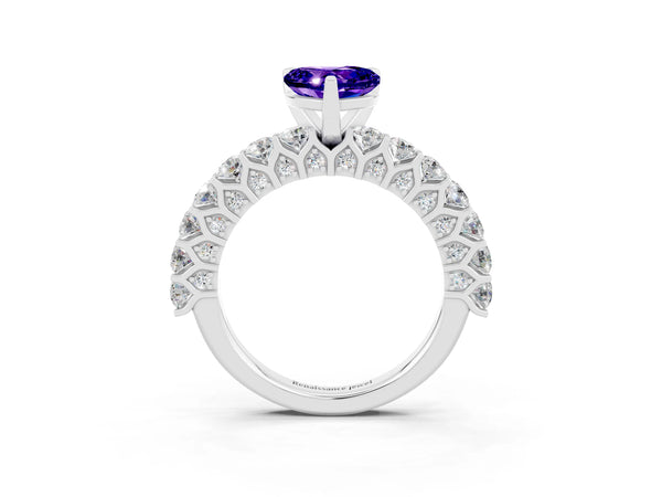 Platinum Heart Cut Tanzanite Solitaire Ring with Shared Prong Pavé Band and Four-Prong Setting