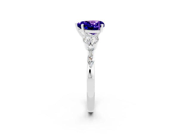 Silver Heart Cut Tanzanite Solitaire Ring with Side Stones and Four-Prong Setting