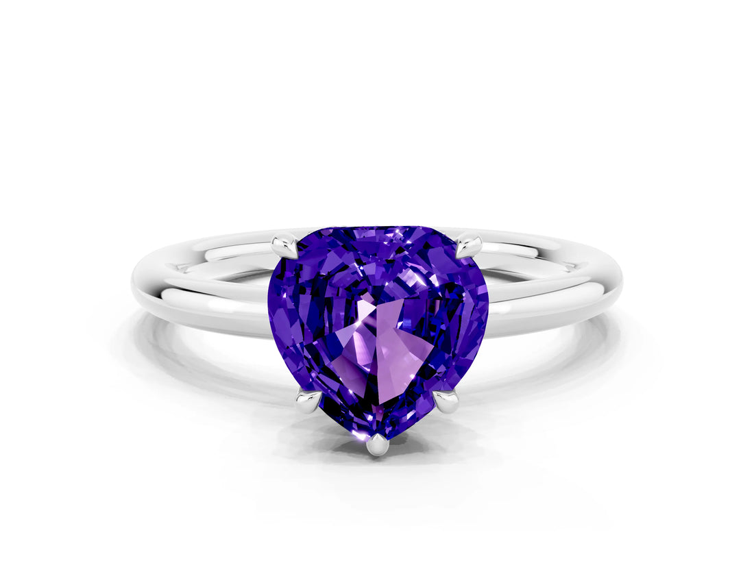 White gold Heart Cut Tanzanite Solitaire Ring with Thin Band and Four-Prong Setting
