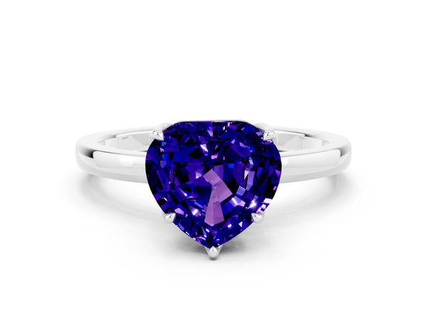 Platinum Heart Cut Tanzanite Solitaire Ring with Thin Band and Prong Setting