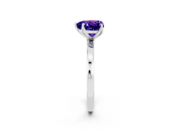 White gold Heart Cut Tanzanite Solitaire Ring with Thin Band and Prong Setting