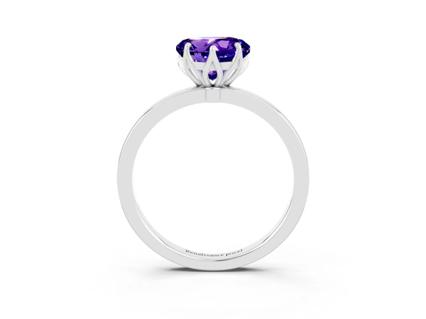 Platinum Heart Cut Tanzanite Solitaire Ring with Thin Band and Prong Setting