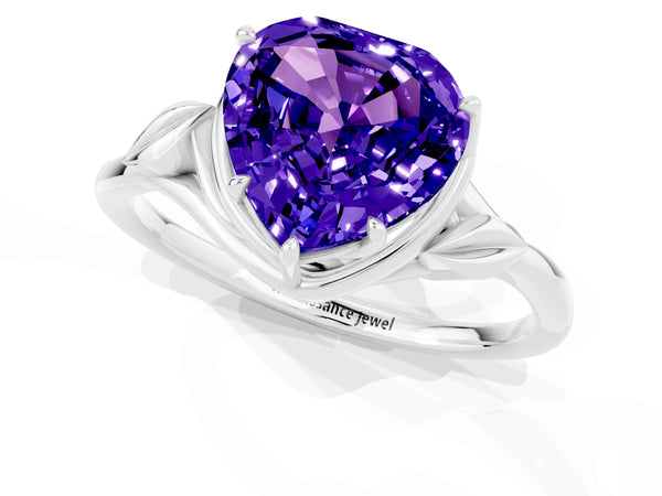 Silver Heart Cut Tanzanite Solitaire Ring with Twist Band and Four-Prong Setting