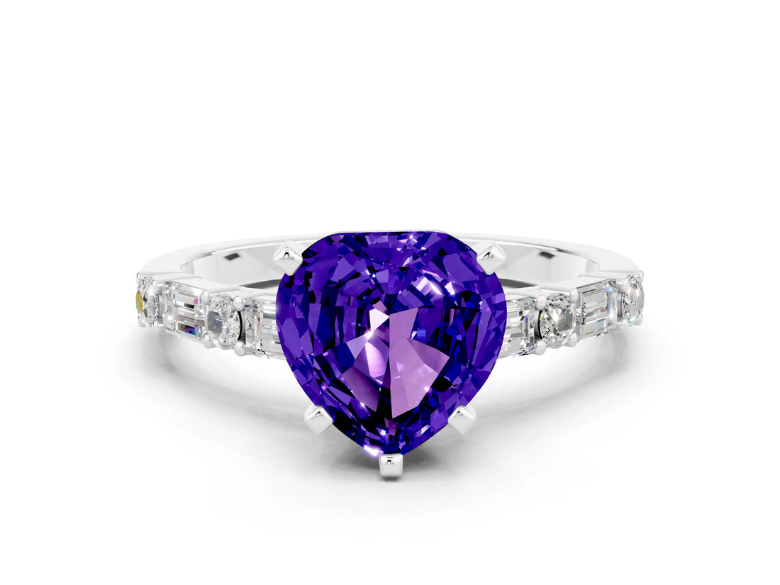 White gold Heart Cut Tanzanite Solitaire with Side Baguettes and Channel Set Band