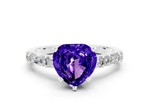 White gold Heart Cut Tanzanite Solitaire with Side Baguettes and Channel Set Band