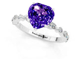 White gold Heart Cut Tanzanite Solitaire with Side Stones on a Pavé Band and Four-Prong Setting_1