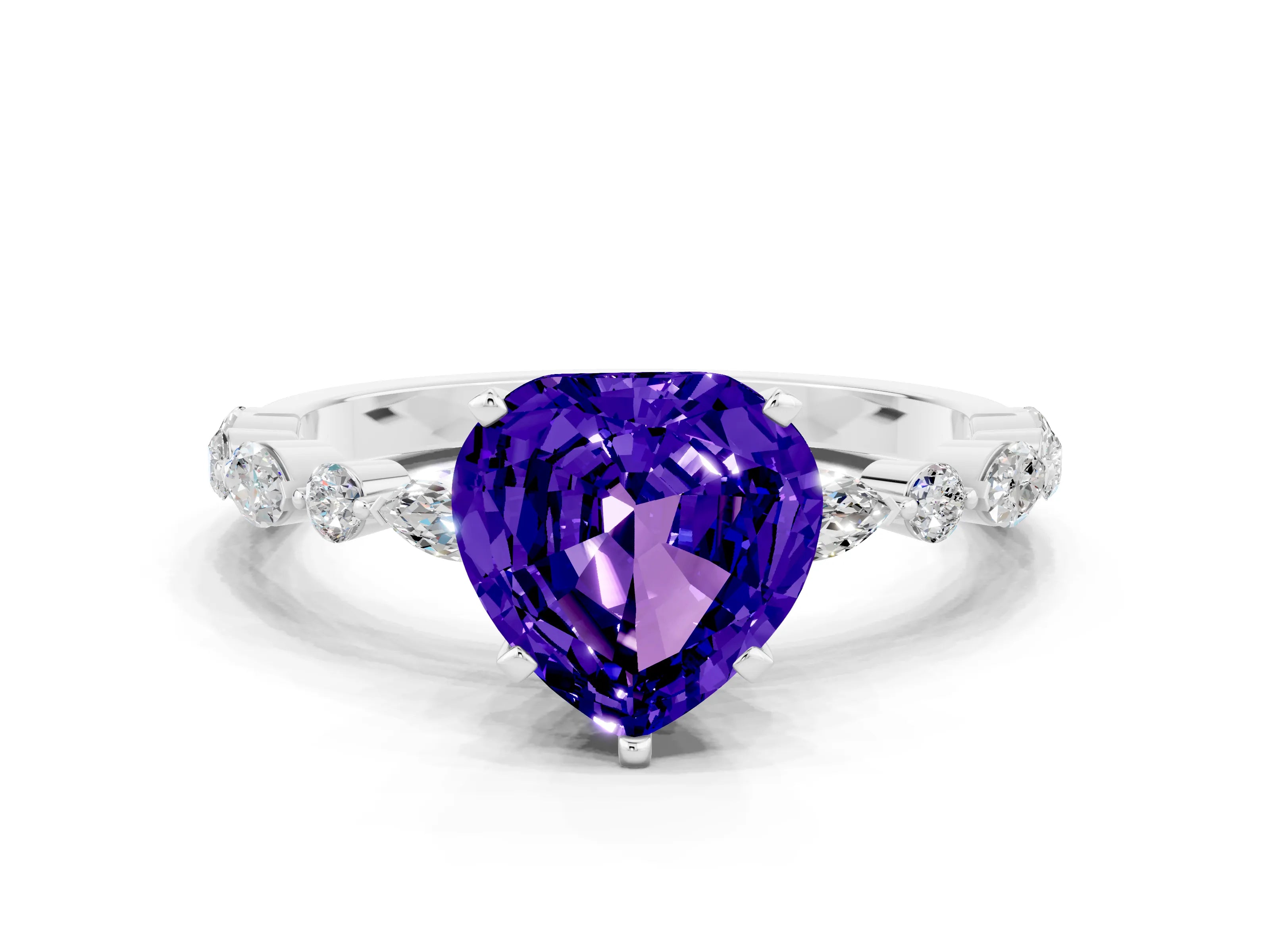 White gold Heart Cut Tanzanite Solitaire with Side Stones on a Pavé Band and Four-Prong Setting