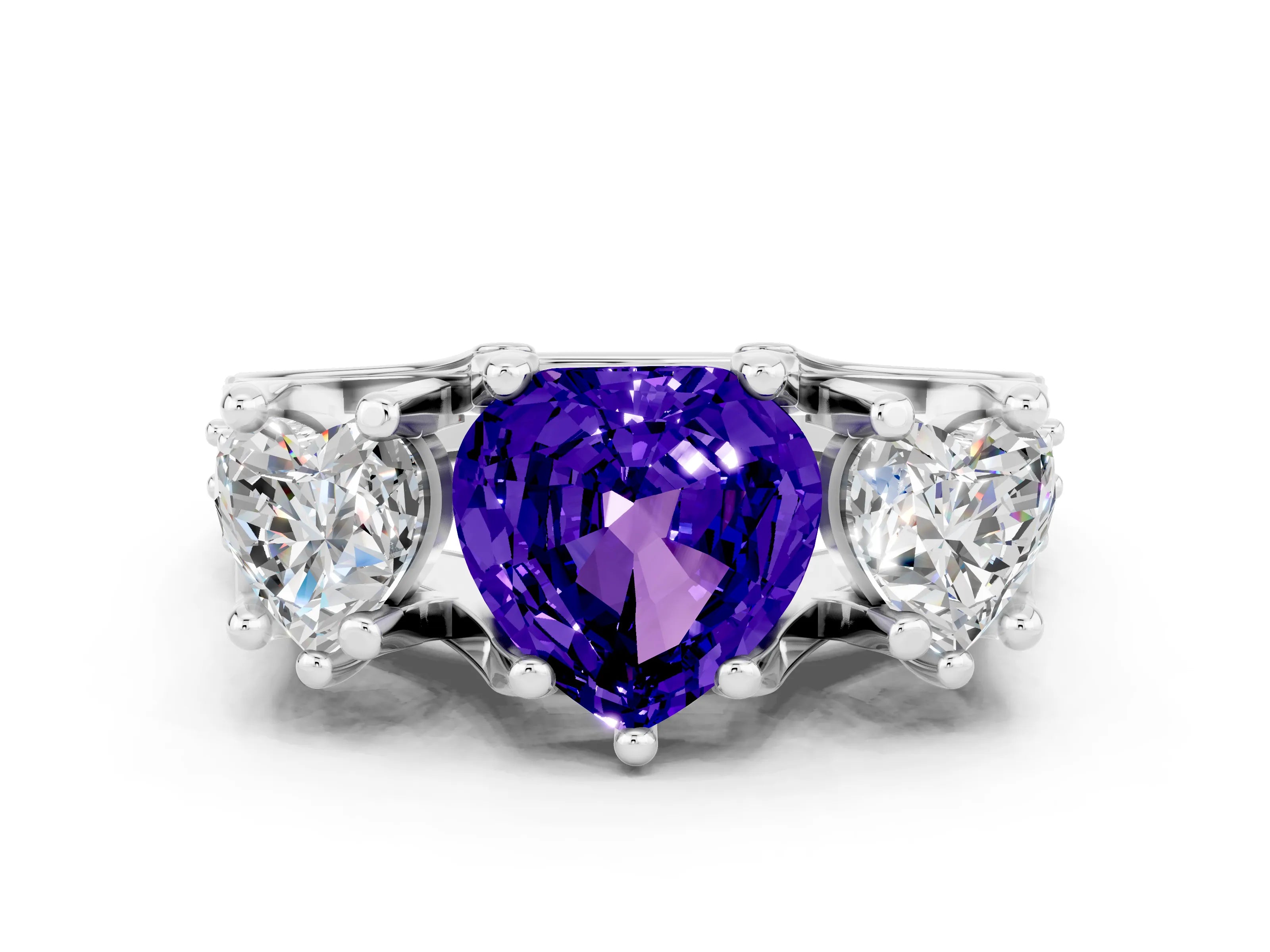 White gold Heart Cut Tanzanite Three-Stone Ring with Channel Set Band and Four-Prong Setting