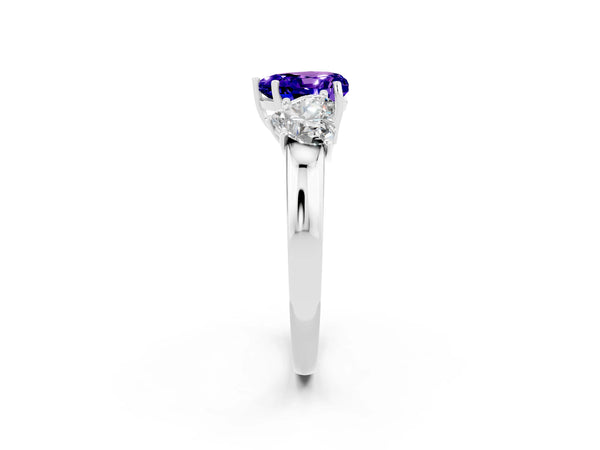 Platinum Heart Cut Tanzanite Three-Stone Ring with Four-Prong Setting and Classic Band