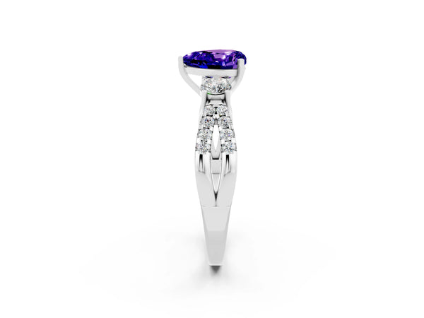 White gold Heart Cut Tanzanite Three-Stone Ring with Pavé Split Shank and Four-Prong Setting