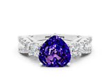 White gold Heart Cut Tanzanite Three-Stone Ring with Pavé Split Shank and Four-Prong Setting
