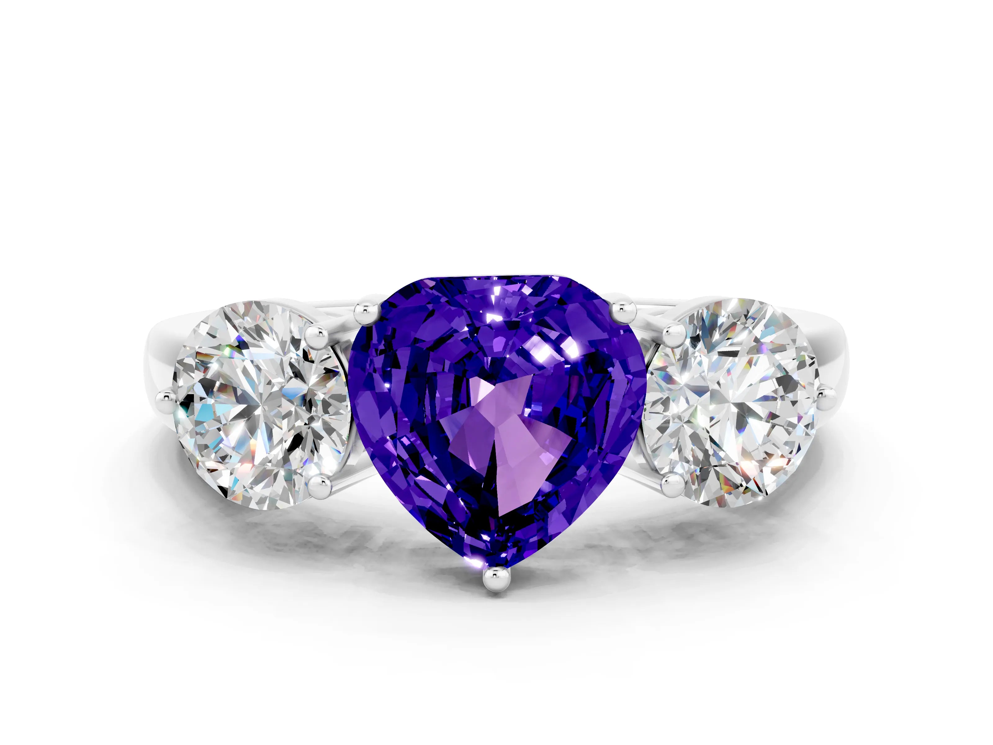 White gold Heart Cut Tanzanite Three-Stone Ring with Prong Setting and Classic Band