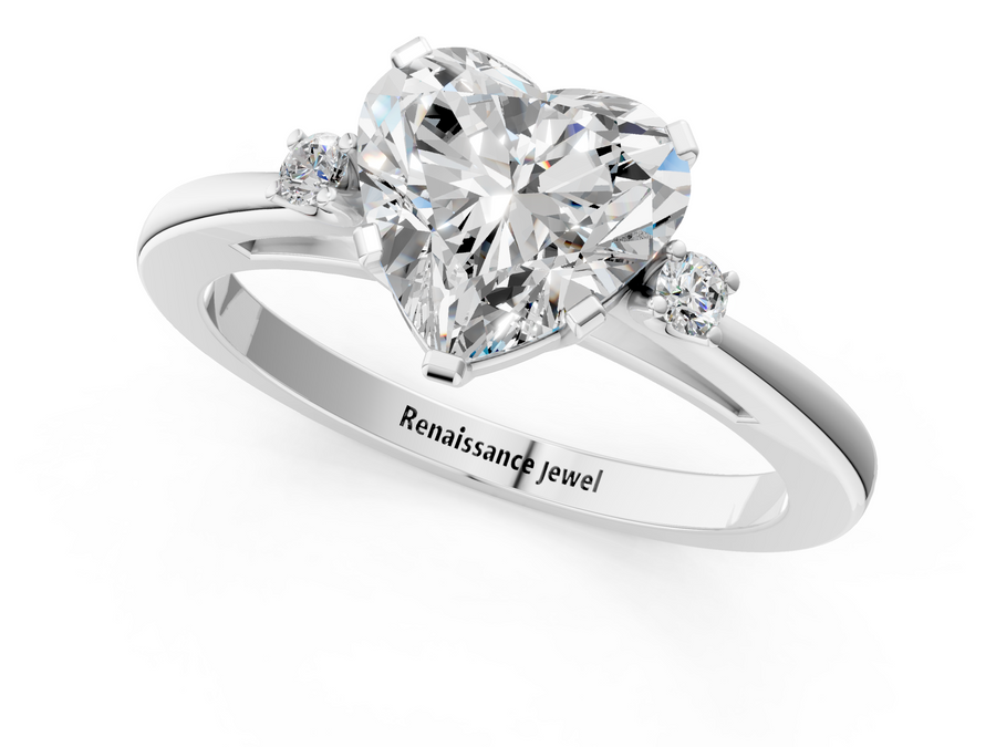 White gold Heart Cut Three-Stone Solitaire Ring with Round Accent Diamonds and Four-Prong Setting